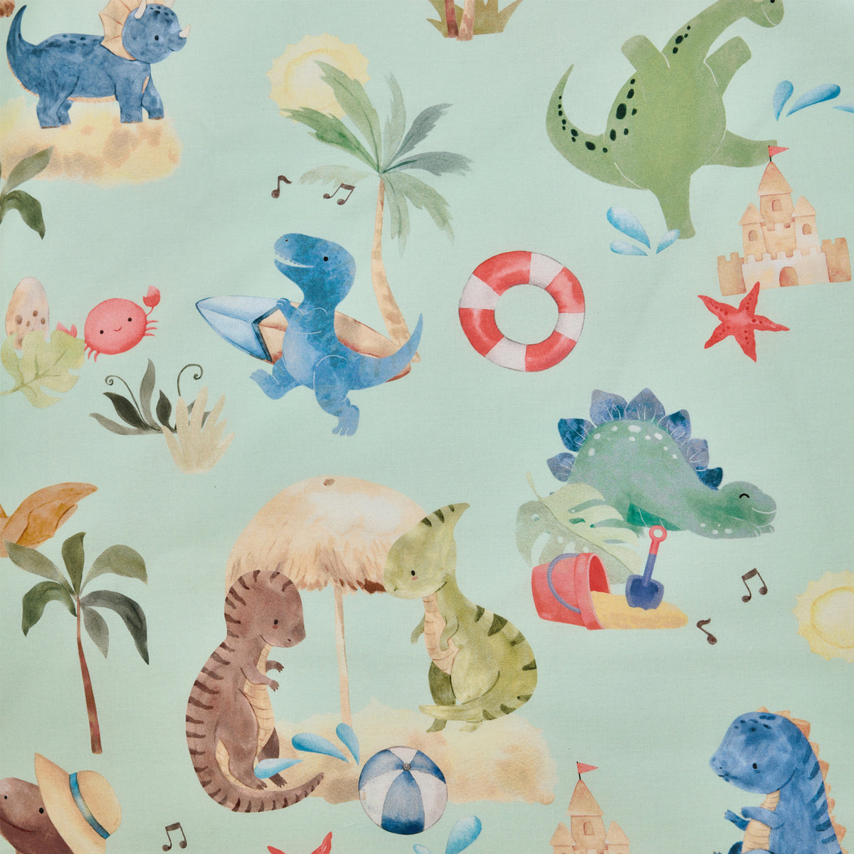 Close-up of the bb&b Kids Dino Beach Party print on a mint green background, featuring colourful dinosaurs, palm trees, beach balls, sandcastles and seaside motifs.
