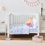 bb&b Kids Mermaid Dreams cot styled with a light blue mermaid-themed cot cover, finished with a mermaid-shaped cushion and white pillow.