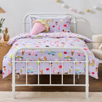 bb&b Kids Ice Cream Shop duvet cover set styled on a white metal bed, featuring a lilac print with colourful ice creams, popsicles, cherries and ice cream trucks.