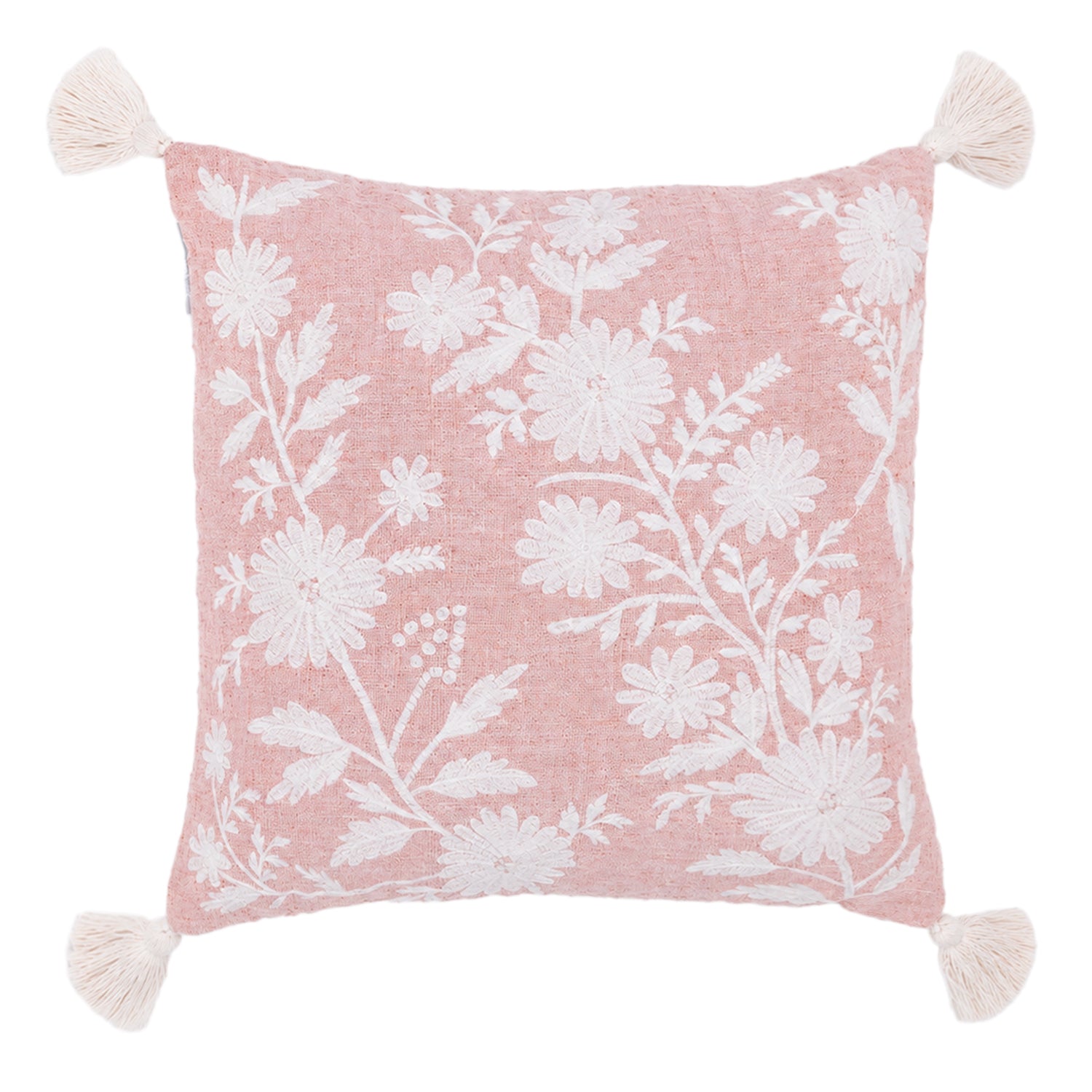 A soft blush cushion featuring an elegant white floral print and decorative tassel corners adds a fresh, charming touch to any living space.