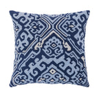 A square navy blue cushion with an intricate woven light blue geometric pattern is displayed against a clean white background.