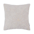 A soft ivory cushion featuring an intricately embroidered floral pattern in tonal cream thread adds elegant texture and understated sophistication to any living space.