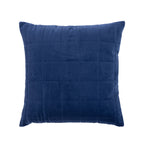 A square blue velvet cushion with a subtle grid-quilted texture, shown against a plain white background.