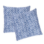 Two square throw pillows with a blue and white floral block print pattern, arranged overlapping on a solid white background.