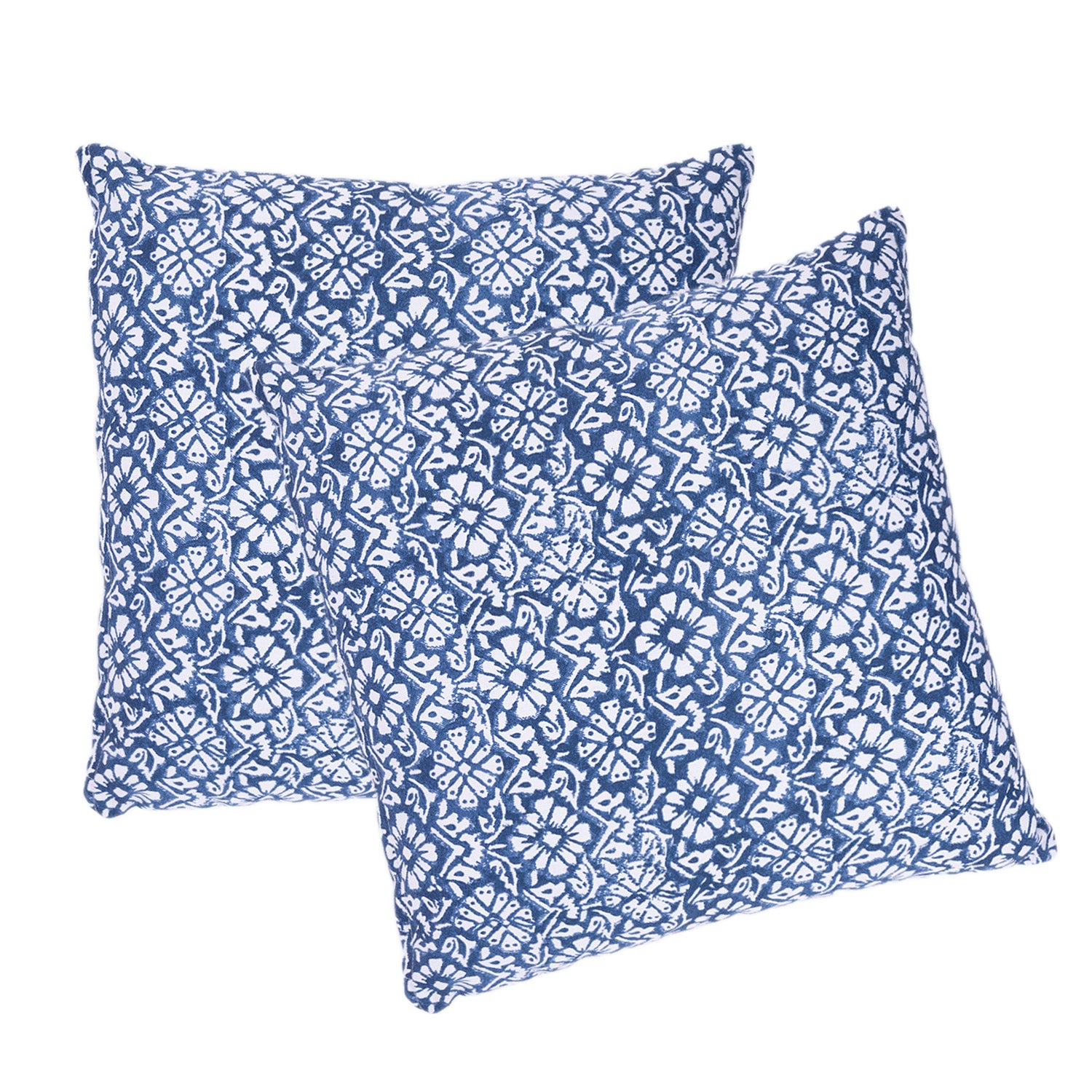 Two square throw pillows with a blue and white floral block print pattern, arranged overlapping on a solid white background.