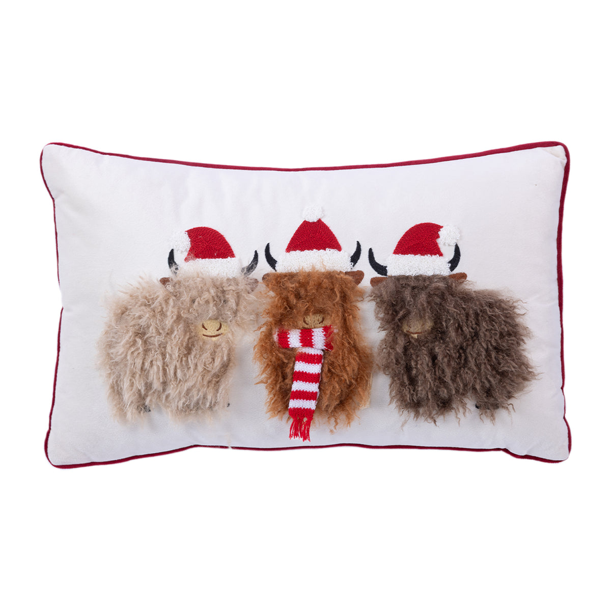 Front view of a white Christmas cushion featuring three fluffy Highland cows in Santa hats, with the centre cow wearing a red and white striped scarf.