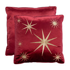 Front and back views of the red velvet Christmas Gold Star Cushion, featuring gold embroidered stars and a plain red reverse.