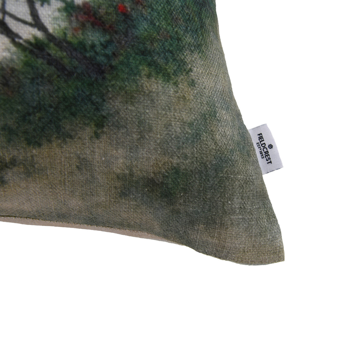 Close-up of the Fieldcrest Coastal Pohutukawa Cushion corner showing the textured fabric, stitched edge and Fieldcrest brand label.