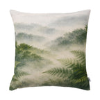 Fieldcrest Northland Forest Cushion featuring a misty green forest landscape with layered native foliage and fern details in soft natural tones.