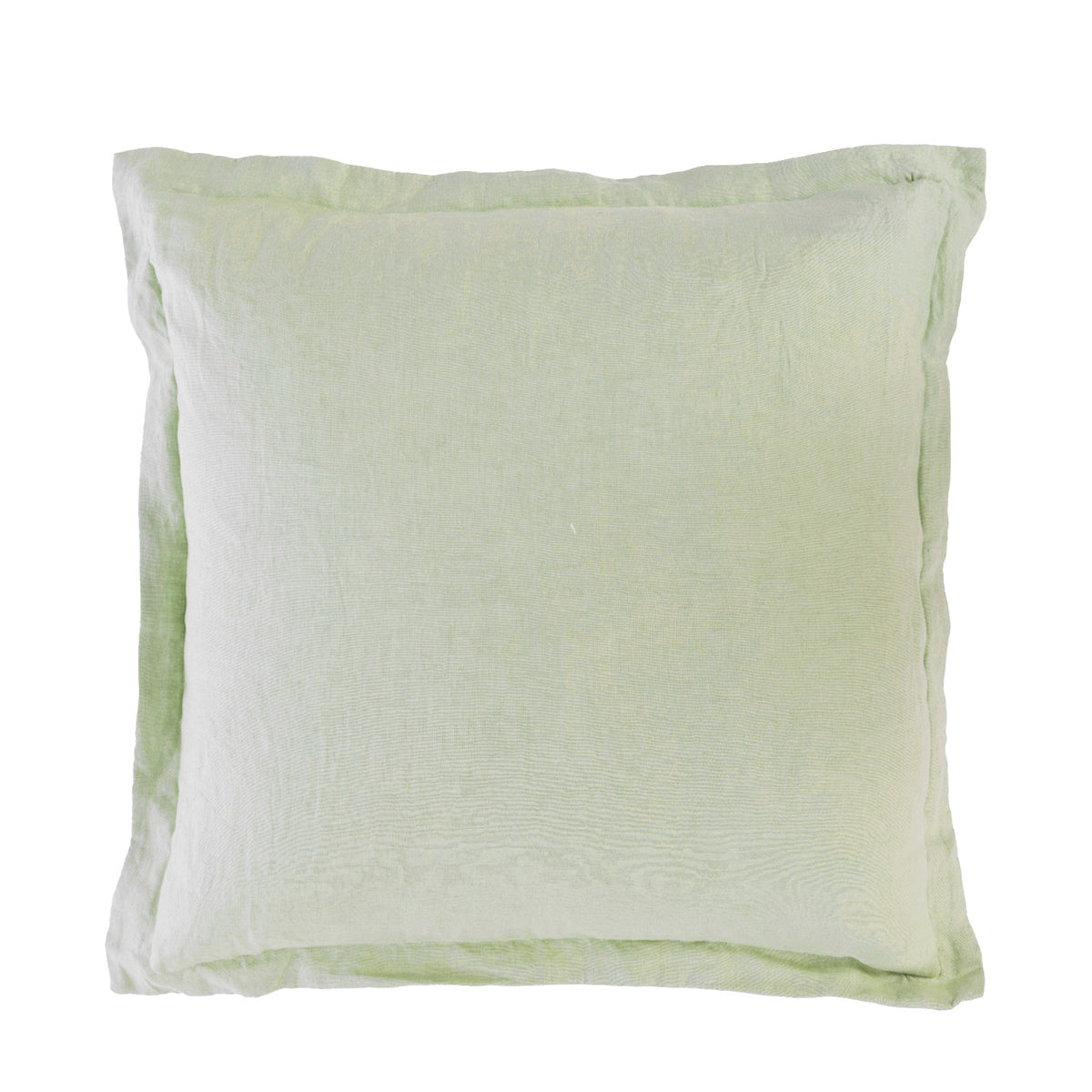 A pistachio linen cushion is presented against a clean white background, showcasing its soft, natural texture, relaxed edges and timeless understated style.