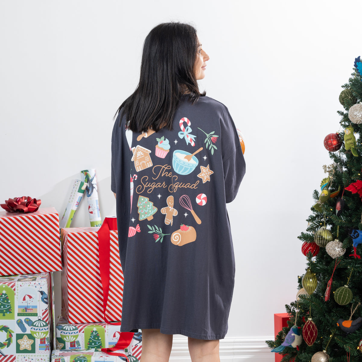 Back view of the Christmas Wishes Christmas Sugar Squad Sleep Tee in charcoal, featuring a large colourful Sugar Squad festive baking print.