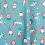 Close-up of the jade Christmas Gnome Sleep Tee fabric featuring colourful festive gnomes, gifts and Christmas-themed illustrations.