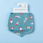Christmas Wishes Christmas Gnome Dog Bandana in jade displayed flat on branded packaging, featuring an all-over festive gnome print with Christmas presents and holiday motifs.