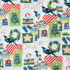 Close-up of the Christmas Wishes Tui Women’s PJ fabric featuring tūī birds, Christmas trees, wreaths, gifts, ornaments and festive motifs.