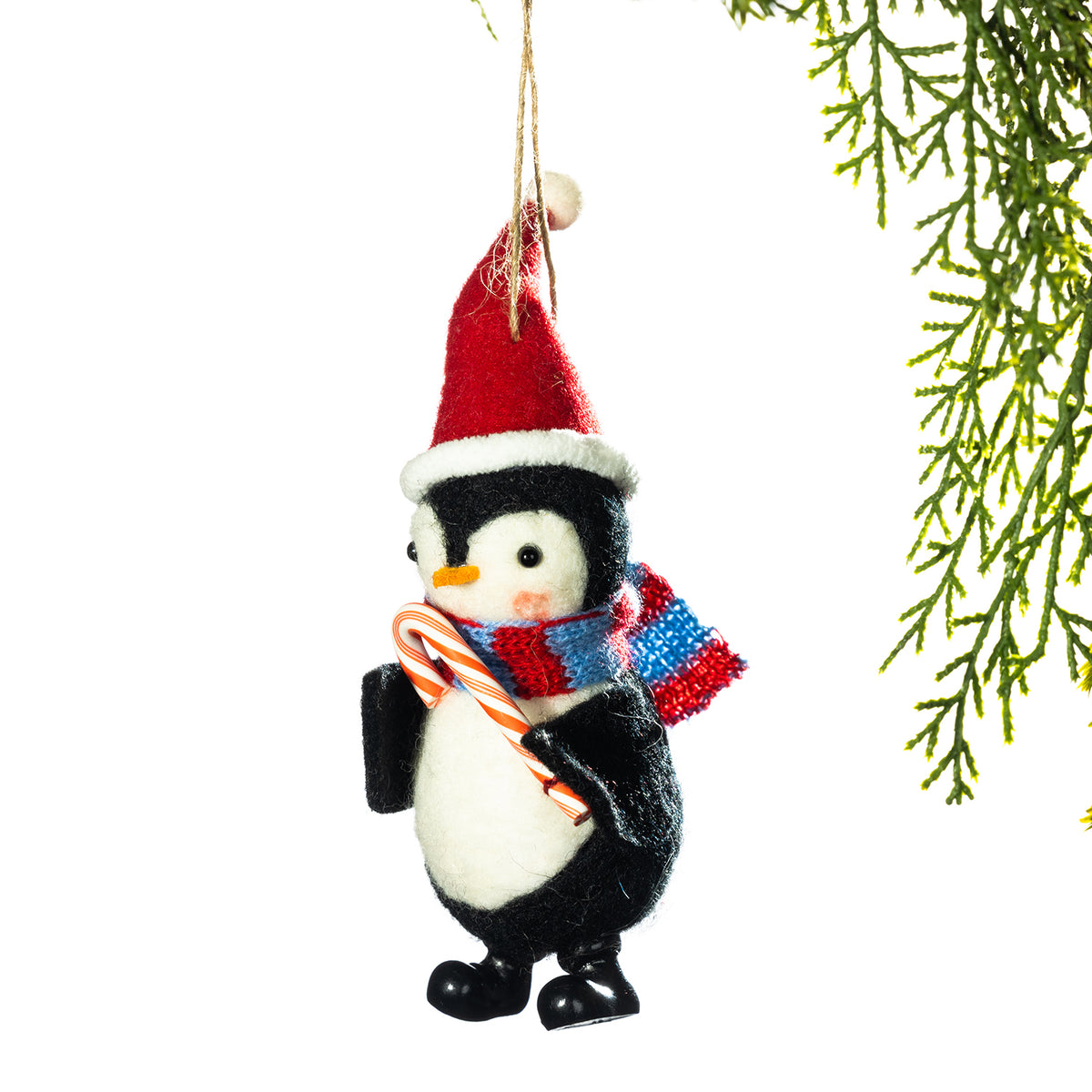 Penguin with a red hat and a candy cane