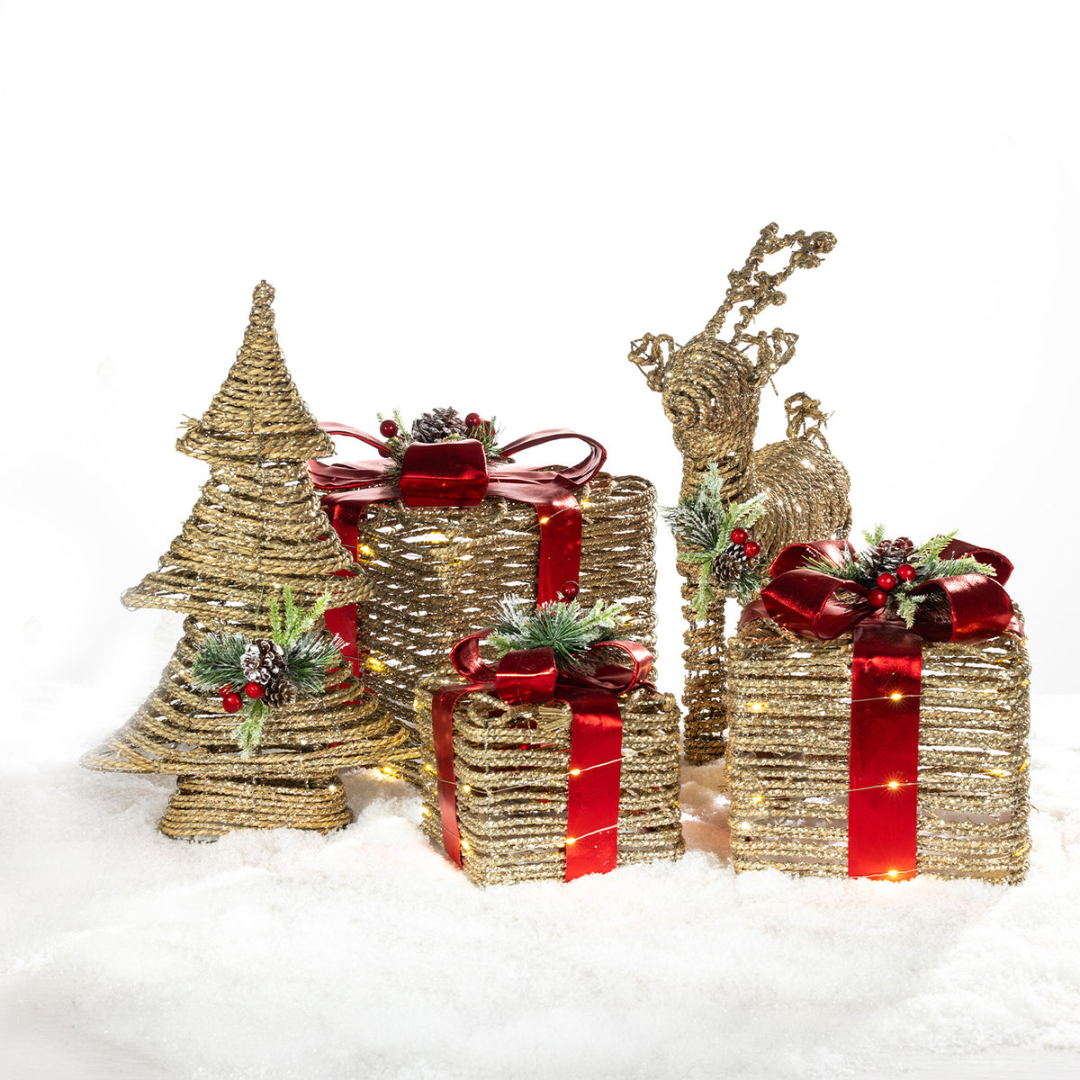 Christmas Wishes rattan Christmas tree, standing deer and illuminated gift box decorations with red ribbon, festive greenery and berry detailing.