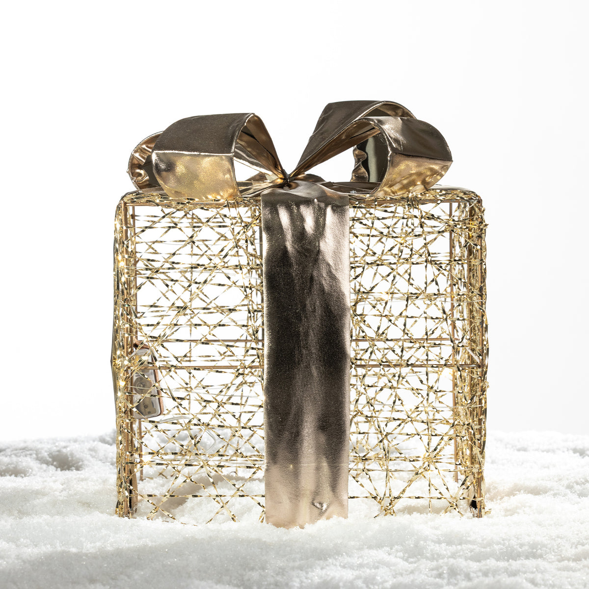 Large Christmas Wishes gold present box LED decoration with an open wire design, metallic bow and warm white lights.