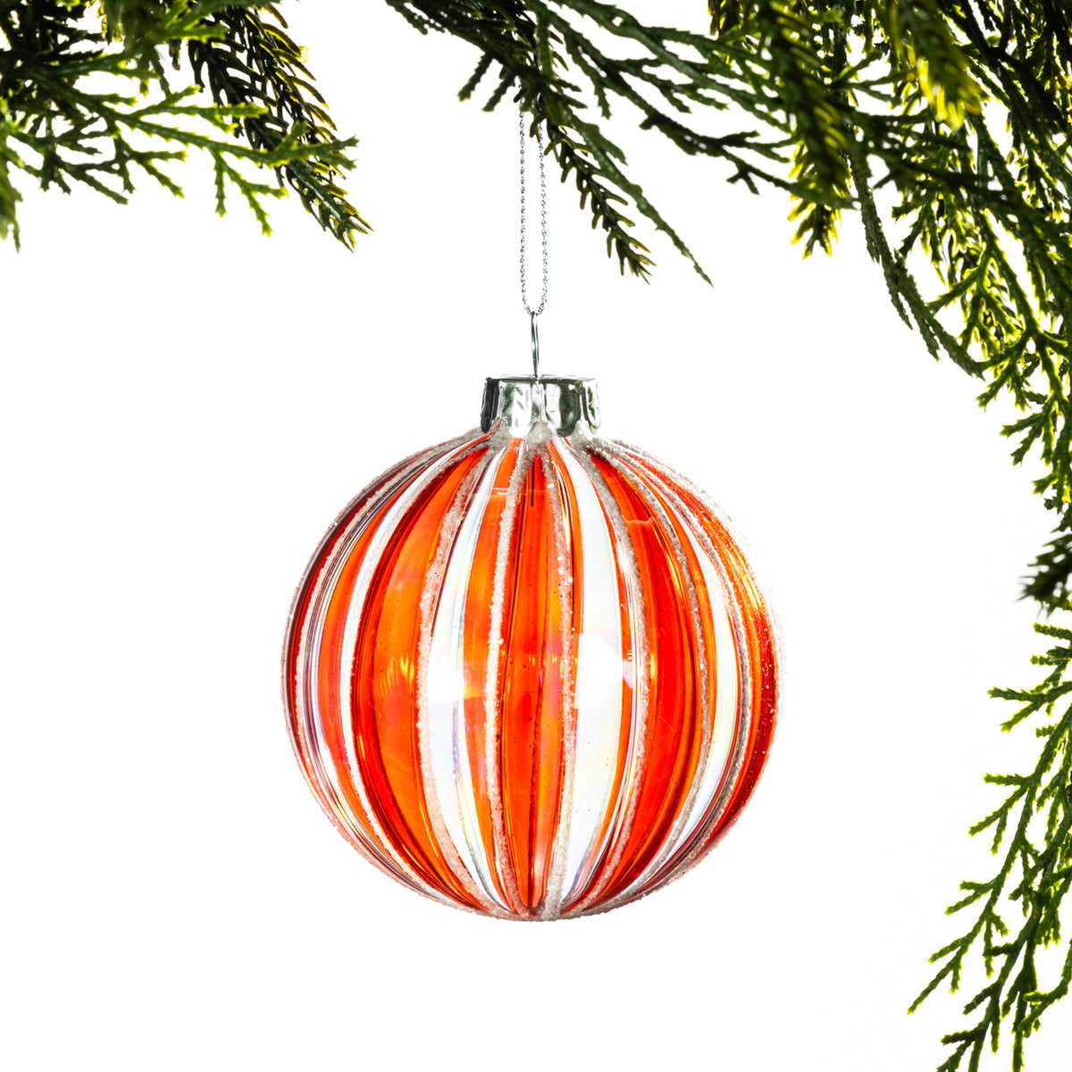 Christmas Wishes Candy Cane Round Glass Bauble – Round glass Christmas bauble featuring alternating red and clear vertical stripes with subtle glitter detailing and a silver hanging cap.