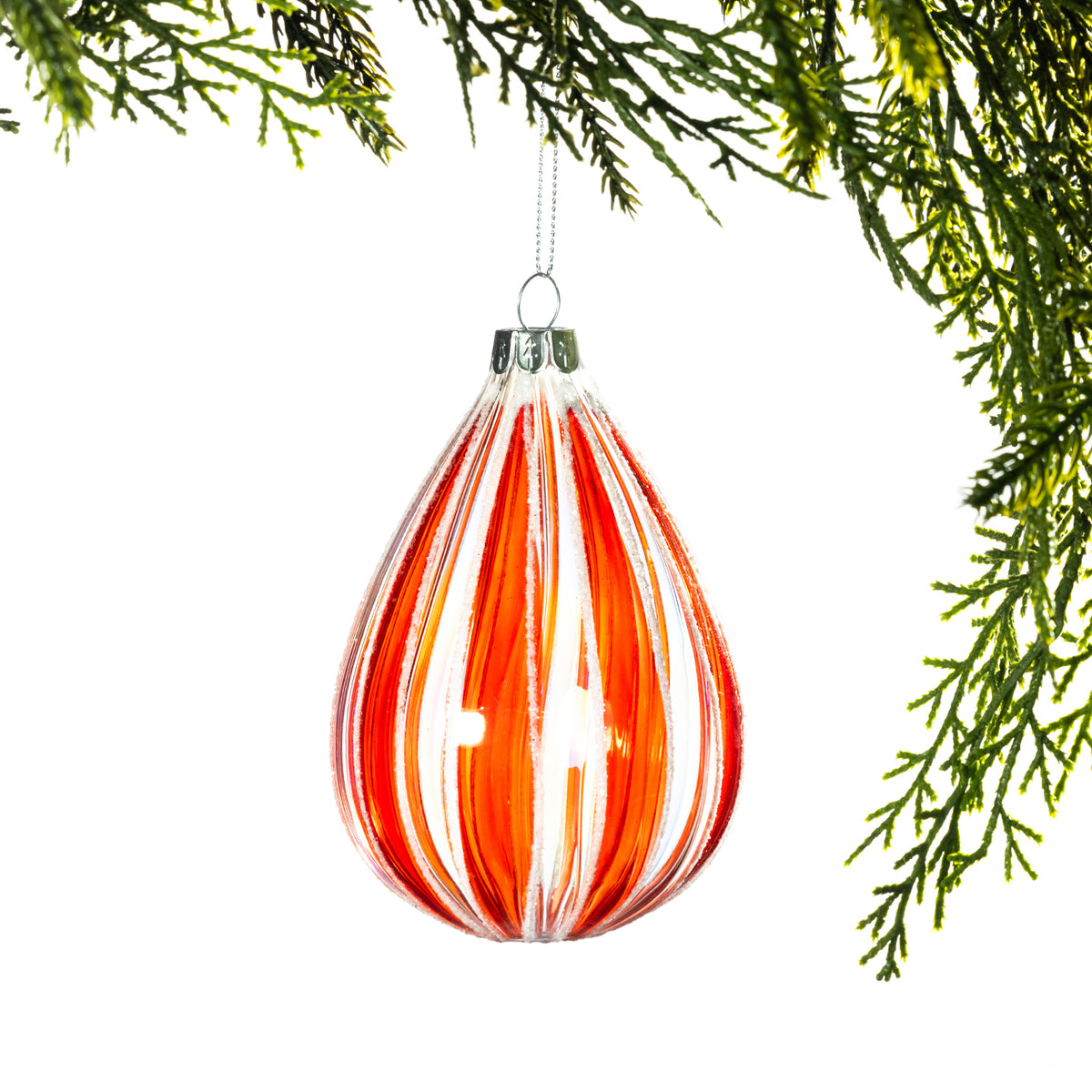 Christmas Wishes Candy Cane Long Glass Bauble – Elongated teardrop-shaped glass bauble with red and clear vertical striping, glitter accents and a silver hanging cap.