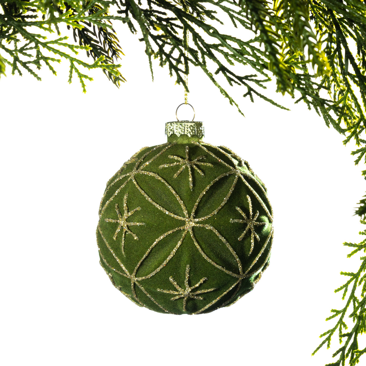 Christmas Wishes Flocked Green Flower Bauble – Green flocked round Christmas bauble featuring an elegant floral-inspired pattern outlined in shimmering gold glitter and finished with a metallic hanging cap.