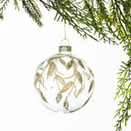 Christmas Wishes Clear Champagne Leaf Glass Bauble – Clear glass round bauble featuring delicate champagne-coloured leaf and branch motifs with shimmering glitter accents for an elegant festive finish.