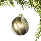 Christmas Wishes Champagne Glitter Swirl Bauble – Champagne round bauble featuring sweeping glitter swirl panels that wrap around the surface, creating an elegant and shimmering Christmas tree decoration.