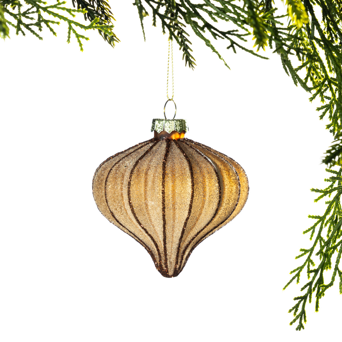 Christmas Wishes Bronze Frosted Onion Glass Bauble – Bronze onion-shaped glass bauble featuring a frosted glitter finish with dark vertical detailing that highlights its sculpted shape. A striking ornament for adding texture and warm metallic tones to your festive display.
