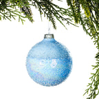 Christmas Wishes Textured Blue Glass Bauble Ice Blue – Create a fresh winter look with this round ice blue glass bauble. Finished with a softly frosted surface and textured sparkling detailing, it brings depth, shimmer and a delicate icy touch to your Christmas tree.