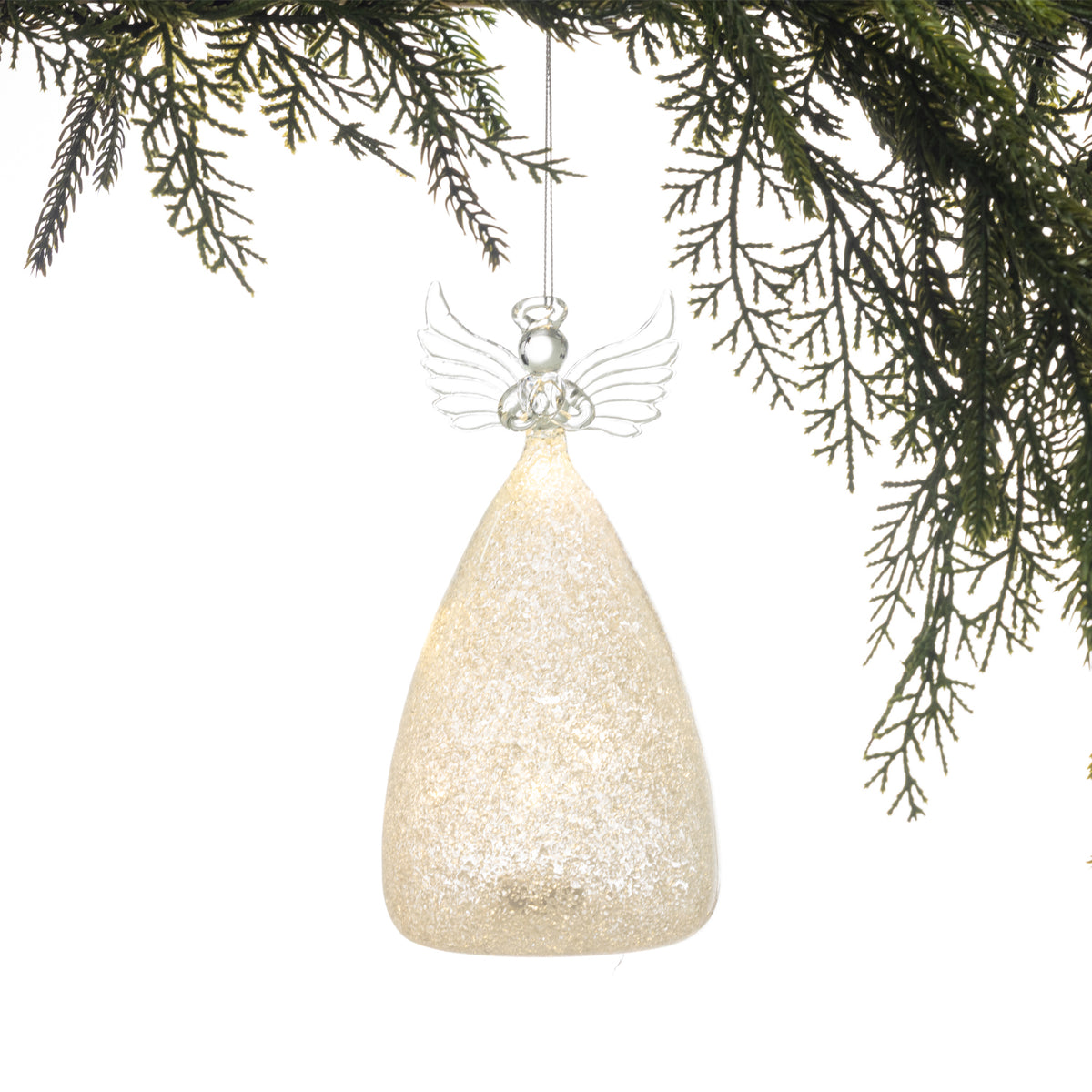 Christmas Wishes Angel Shimmer Skirt LED Decoration – Add a warm, heavenly glow to your Christmas display with this illuminated angel decoration. Featuring clear angel wings and a shimmering textured skirt, the internal LED lighting creates a soft warm light that beautifully highlights the sparkling finish. Perfect for adding an elegant festive touch to shelves, mantels or tabletop displays.