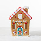 Christmas Wishes gingerbread house cookie jar featuring Santa, candy canes, colourful Christmas lights and “Cookies for Santa” lettering.