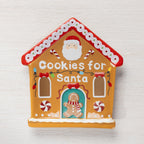 Gingerbread house shaped Christmas plate featuring Santa, candy canes, colourful lights, peppermint details and “Cookies for Santa” lettering.