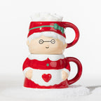 Christmas Mrs Claus mug set featuring two stackable red and white mugs, with the top mug filled with marshmallows.