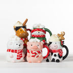 Assorted Christmas animal mugs featuring a horse, cat, sheep, pig and cow, styled with marshmallows, whipped cream and festive treats.