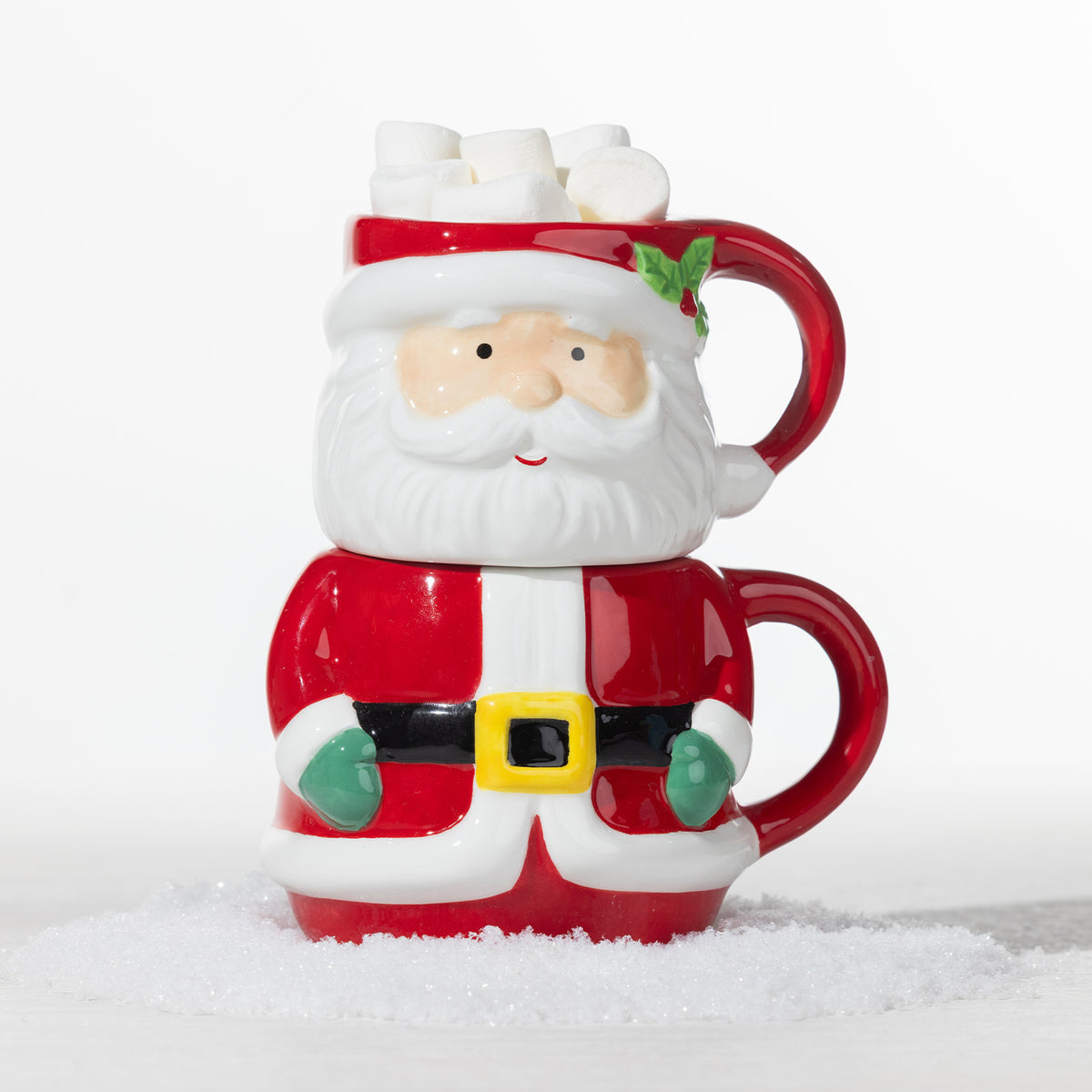 Christmas Santa Claus mug set featuring two stackable red and white mugs, with the top mug filled with marshmallows.