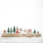 Christmas Wishes Santa’s Sleigh Countdown – Wooden Christmas countdown featuring Santa in his sleigh with reindeer, Christmas trees and numbered dates from 1 to 24 with a movable house marker.