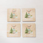 Christmas Wishes Reindeer Coasters Set of 4 – Set of four square wooden coasters featuring a festive reindeer, Christmas tree, wrapped presents, snowflakes and “Christmas” lettering.