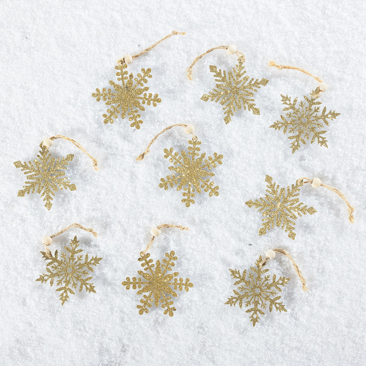 snowflake decorations in gold