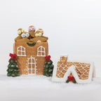 A Christmas gingerbread house cookie jar.