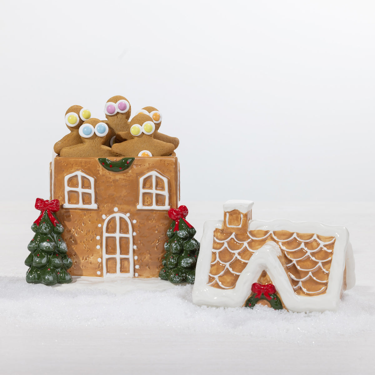 A Christmas gingerbread house cookie jar.