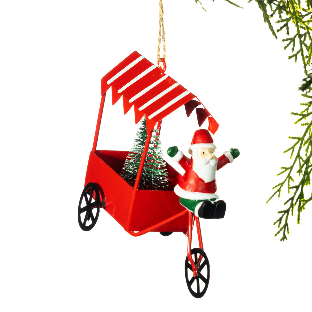 Santa on a red tricycle 