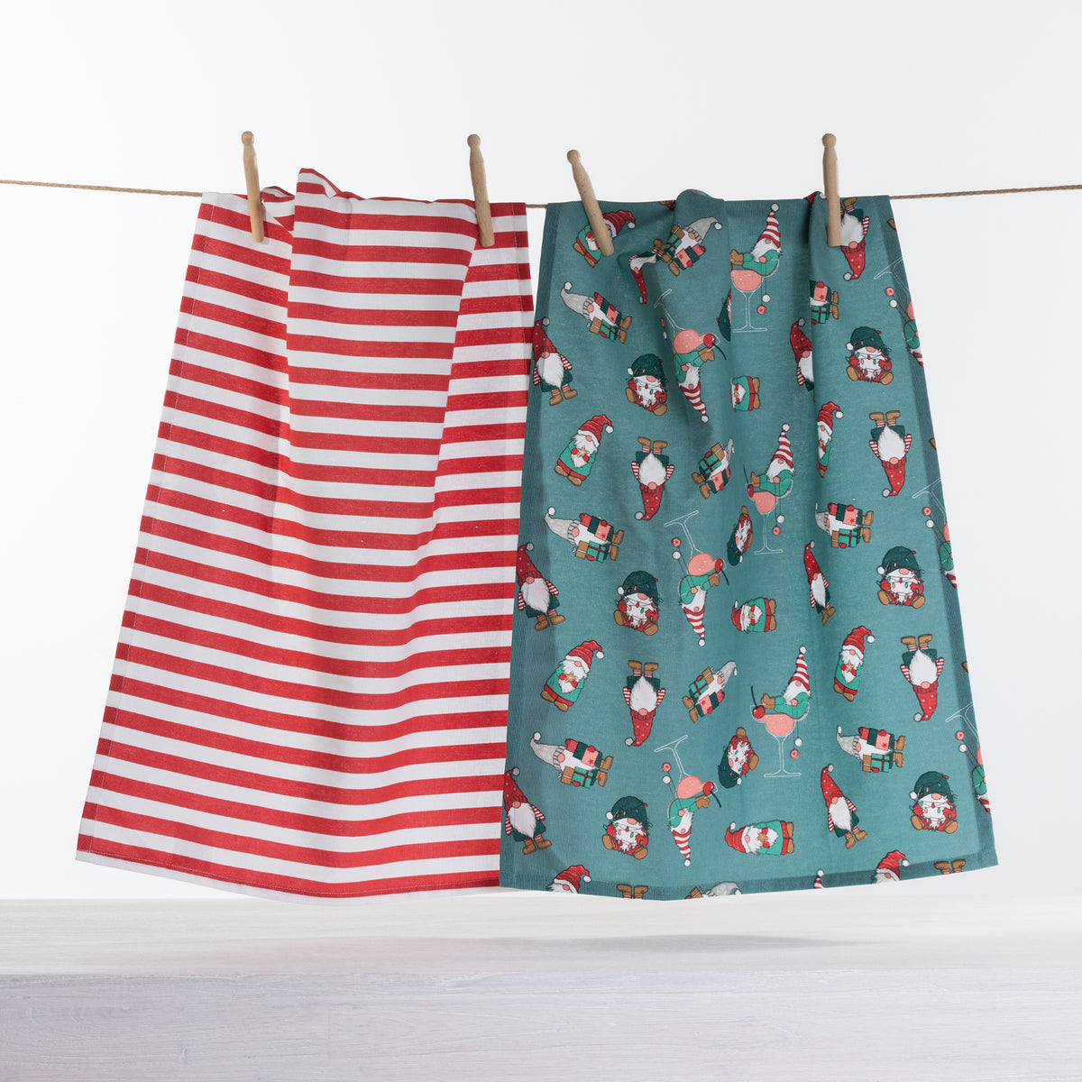 Christmas Wishes Chillin with Gnomies tea towel 2 pack with red and white striped towel and teal festive gnome print towel.