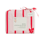 Christmas Wishes Bows Euro Pillowcase Pair featuring red stripes and festive bows on pale pink fabric, neatly folded in matching packaging with a ribbon tie.