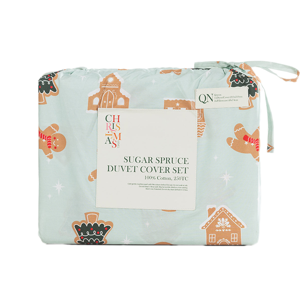 Christmas Wishes Sugar Spruce Duvet Cover Set featuring festive gingerbread men, gingerbread houses and Christmas trees on pale mint fabric, neatly folded in matching packaging with a ribbon tie.