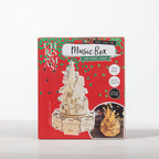 Make Your Own Santa Music Box puzzle kit presented in festive red packaging, featuring a laser-cut wooden Santa scene designed to play music and spin once assembled.