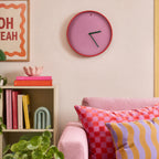 Pink Clock in a Colourful lounge