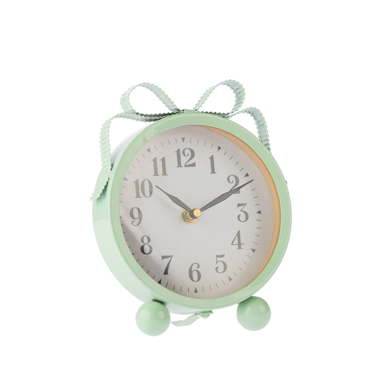 Mint green round table clock shown at an angle, featuring a white clock face, black numerals, ribbon-style loops and rounded feet.