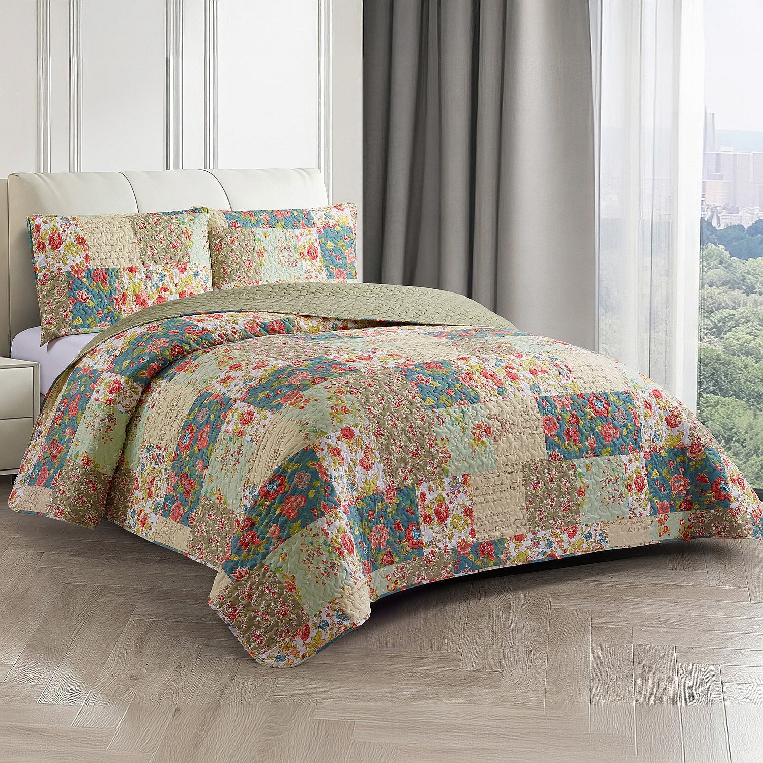 Multicoloured patchwork coverlet set styled on a bed with matching pillowcases in a bright bedroom.