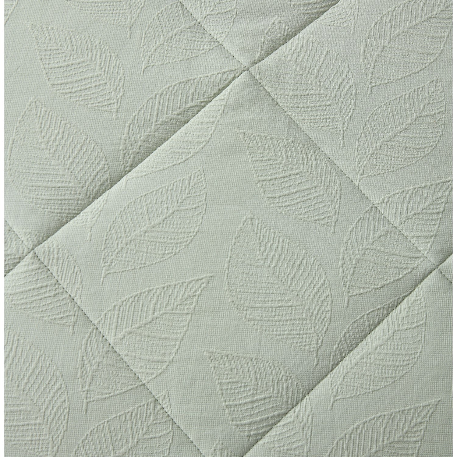 Light Green quilted coverlet close-up showing soft textured fabric and stitched detail