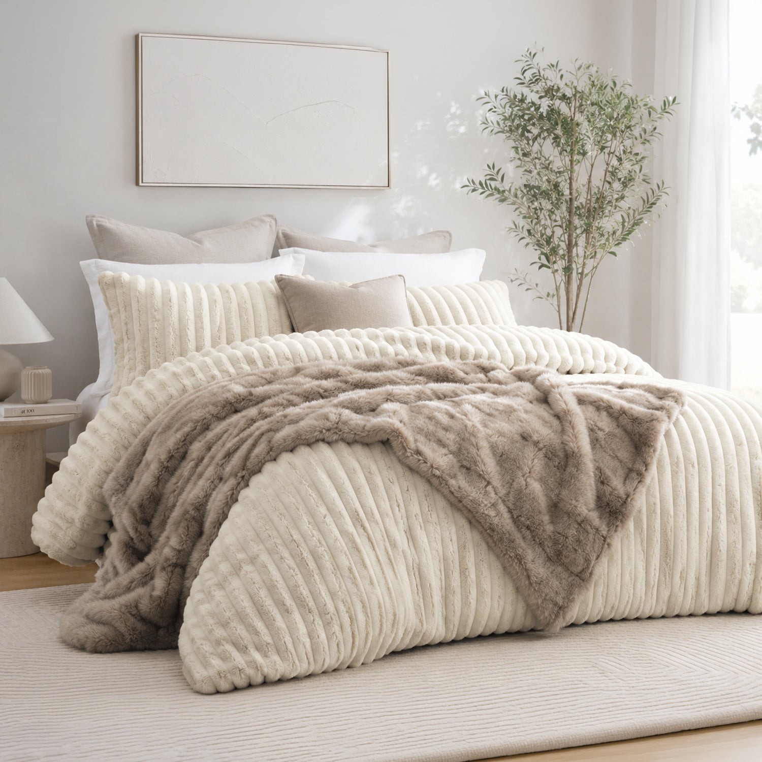 Coconut Milk Colour ribbed comforter set styled on a bed with matching pillows in a neutral bedroom.