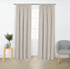 Natural blockout curtain pair with gathered header displayed in a bright modern living room.